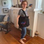 The Enjoy Being Married tote bag, modeled by ProNagger Rachel Z. Cornell
